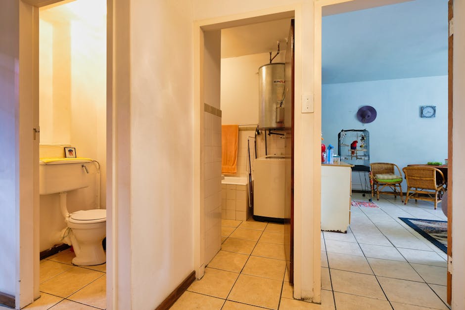 Explore a cozy apartment with a modern interior featuring a bathroom and living area.