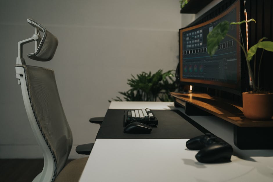 Sleek modern workspace featuring an ergonomic chair and dual monitors, perfect for gaming and productivity.