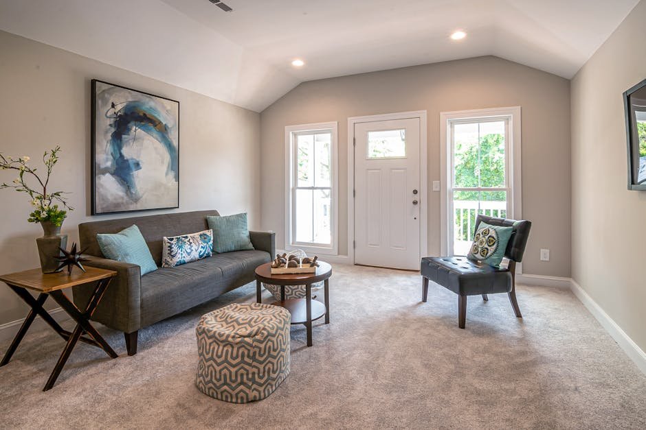 Stylish living room featuring a modern sofa and minimalistic decor for a cozy ambiance.